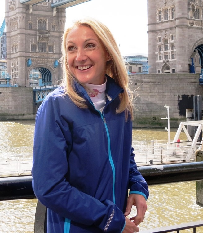 Paula Radcliffe in front of Tower Bridge ahead of the 2015 Virgin London Marathon.