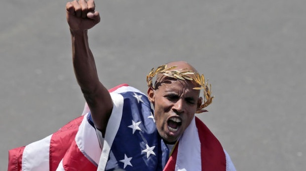 Meb Keflezighi celebrates after winning the 2014 Boston Marathon