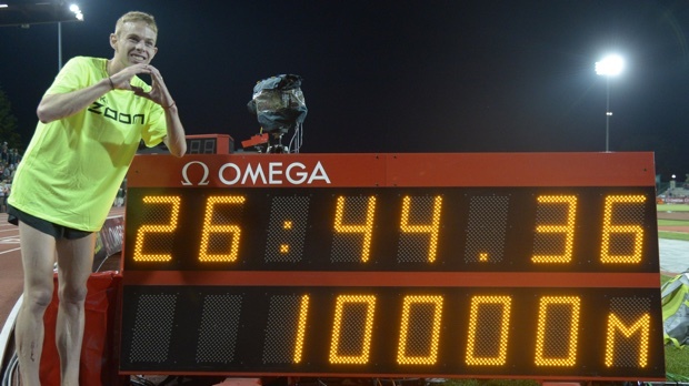 Galen Rupp celebrates after breaking his 10,000m American record at the 2014 Prefontaine Classic (26:44)
