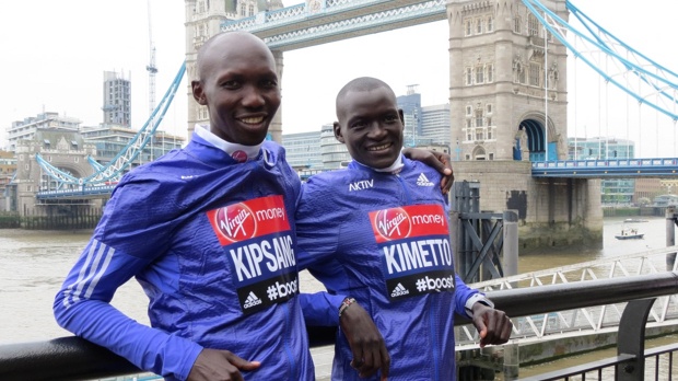 Wilson Kipsang and Dennis Kimetto of Kenya pose in front of Tower Bridge ahead of the 2015 Virgin London Marathon.